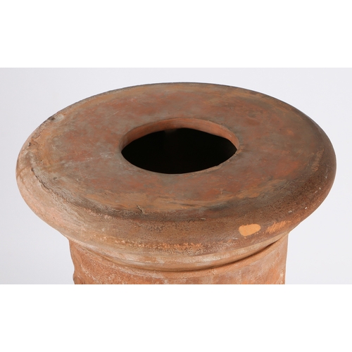 47 - A THOMAS & CO TERRACOTTA PEDESTAL. the circular top on a fluted central column, waisted foot and oct... 