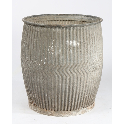 49 - A GALVANISED GARDEN PLANTER. of barrel form with gadrooned decoration, 50cm diameter, 53cm high.