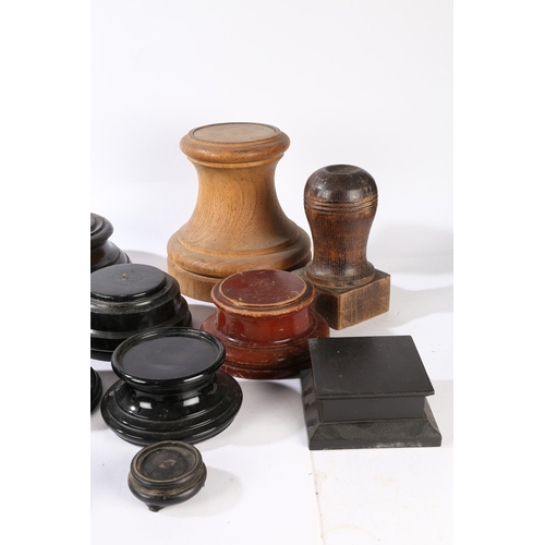 54 - A COLLECTION OF TROPHY AND OTHER STANDS. to include pottery and turned wooden examples, one with ret... 