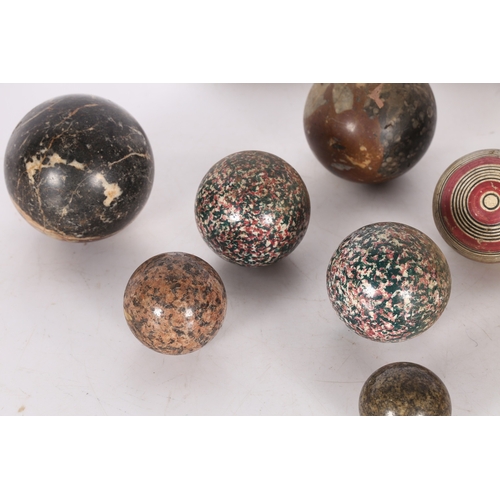 59 - A COLLECTION OF MARBLE AND STONE SPHERES. various sizes and styles, the largest 11cm diameter approx... 