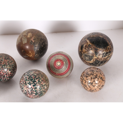 59 - A COLLECTION OF MARBLE AND STONE SPHERES. various sizes and styles, the largest 11cm diameter approx... 