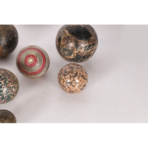 59 - A COLLECTION OF MARBLE AND STONE SPHERES. various sizes and styles, the largest 11cm diameter approx... 