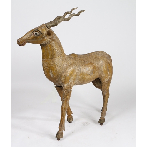 72 - AN INDIAN PAINTED CARVED WOOD MODEL OF A BLACKBUCK/ANTELOPE. modelled in a standing position with pa... 