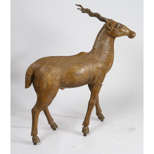 72 - AN INDIAN PAINTED CARVED WOOD MODEL OF A BLACKBUCK/ANTELOPE. modelled in a standing position with pa... 