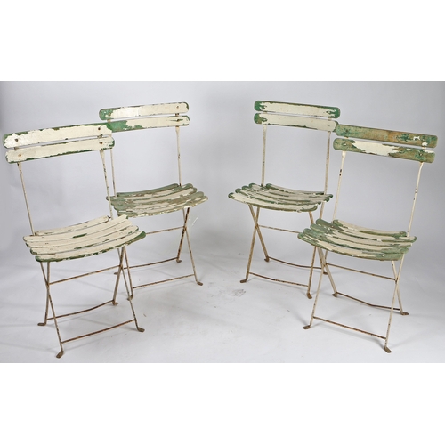 74 - FOUR FRENCH FOLDING PATIO CHAIRS. With painted slatted backs and seats, 45.5cm wide.