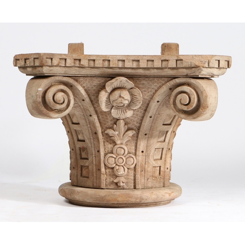 86 - A CARVED OAK IONIC COLUMN CAPITAL. with dentil frieze above foliate lower sections, 56cm wide, 56cm ... 