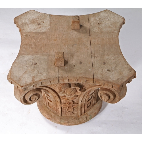 86 - A CARVED OAK IONIC COLUMN CAPITAL. with dentil frieze above foliate lower sections, 56cm wide, 56cm ... 