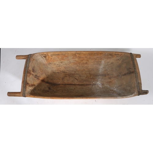 97 - A 19TH CENTURY WOODEN AND METAL BANDED DOUGH TROUGH. the chamfered carrying handles with metal bands... 