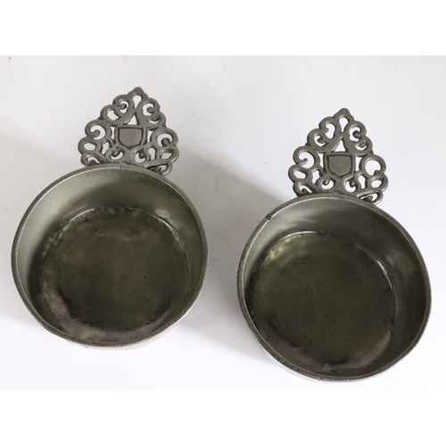 10 - A RARE PAIR OF WILLIAM & MARY PEWTER PORRINGERS, CIRCA 1700. Each having a straight-sided bowl, flar... 