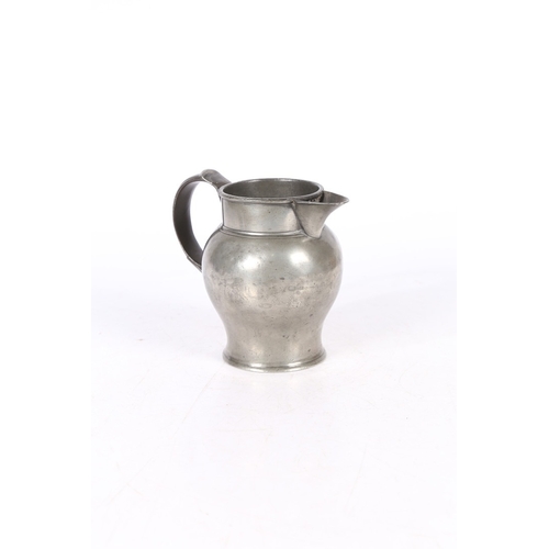 120 - A 19TH CENTURY PEWTER LIDLESS TWO PINT ALE JUG, ENGLISH. The bulbous body with high collar, and grat... 