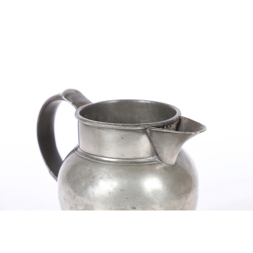 120 - A 19TH CENTURY PEWTER LIDLESS TWO PINT ALE JUG, ENGLISH. The bulbous body with high collar, and grat... 