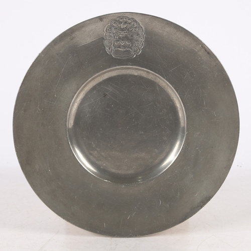 131 - A LATE 17TH CENTURY PEWTER BROAD-RIM PLATE, EUROPEAN. The rim stamped with a mantled heraldic device... 