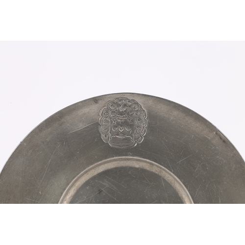 131 - A LATE 17TH CENTURY PEWTER BROAD-RIM PLATE, EUROPEAN. The rim stamped with a mantled heraldic device... 