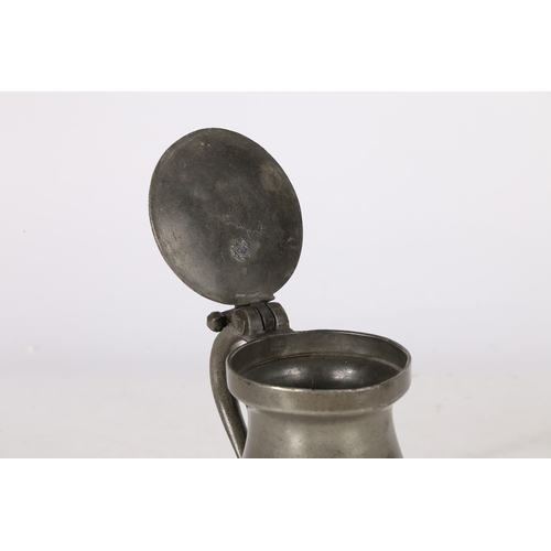 135 - AN 18TH CENTURY PEWTER OEWS PINT DOUBLE-VOLUTE BALUSTER MEASURE, CIRCA 1760. The lid with a pair of ... 