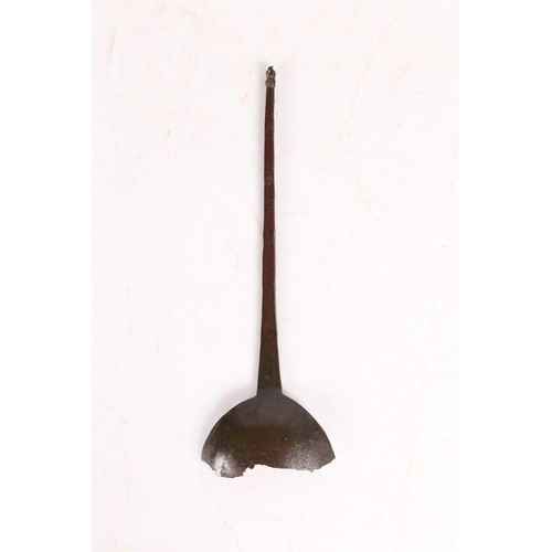 147 - A 13TH CENTURY LATTEN PROTO-ACORN KNOP SPOON FRAGMENT. With cut and filed knop, flattened tapering s... 