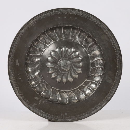 2 - A RARE WILLIAM & MARY PEWTER REPOUSSÉ DECORATED 'ROSEWATER' DISH, CIRCA 1690. The multiple reeded ri... 