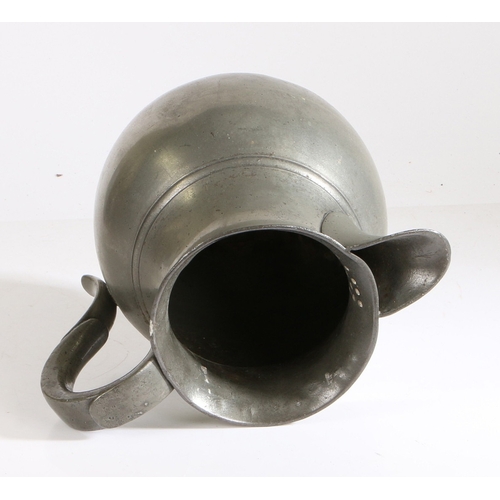 23 - AN EARLY 19TH CENTURY PEWTER OEAS GALLON ALE JUG, CIRCA 1800-50. Having a bulbous body with single f... 