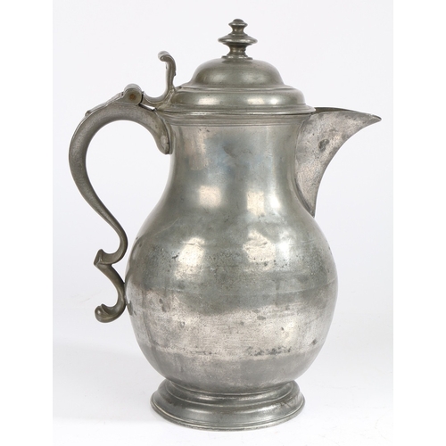 24 - A MID-18TH CENTURY PEWTER BALUSTER-SHAPED LAVER/FLAGON, CIRCA 1750. Having a domed lid with two-tier... 