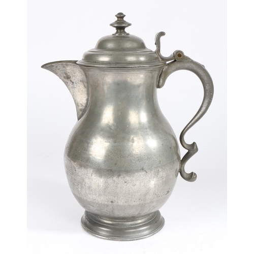 24 - A MID-18TH CENTURY PEWTER BALUSTER-SHAPED LAVER/FLAGON, CIRCA 1750. Having a domed lid with two-tier... 