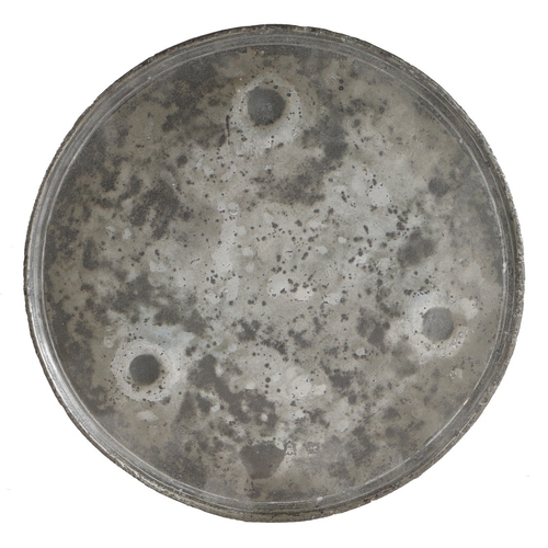 28 - A RARE CHARLES II PEWTER FOOTED PLATE OR TAZZA, CIRCA 1660-80. The flat plate with multiple reeded a... 
