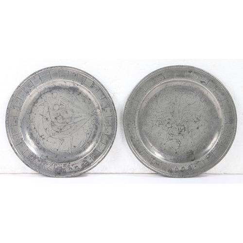 30 - A RARE PAIR OF QUEEN ANNE PEWTER SINGLE-REED RIM WRIGGLEWORK MARRIAGE PLATES, CIRCA 1710. Each rim w... 