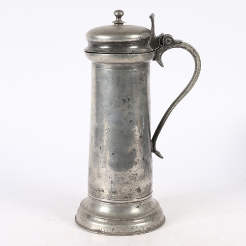 32 - A LARGE CHARLES I PEWTER KNOPPED FLAGON, CIRCA 1630. The cylindrical plain body with bullet-shaped b... 