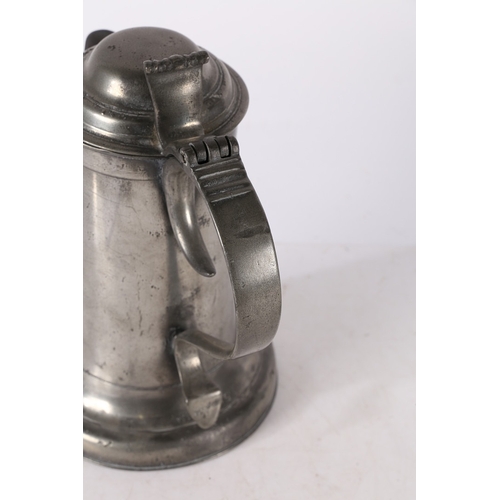 43 - A LATE 18TH CENTURY PEWTER DOME-LID SPOUTED FLAGON, IRISH, CIRCA 1780. Having a plain, straight-side... 