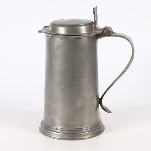 46 - A WILLIAM & MARY PEWTER FLAT-LID FLAGON, YORK, CIRCA 1690. Having a plain straight-sided and taperin... 