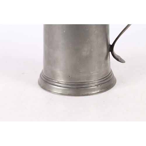 46 - A WILLIAM & MARY PEWTER FLAT-LID FLAGON, YORK, CIRCA 1690. Having a plain straight-sided and taperin... 