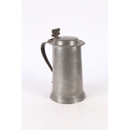 46 - A WILLIAM & MARY PEWTER FLAT-LID FLAGON, YORK, CIRCA 1690. Having a plain straight-sided and taperin... 
