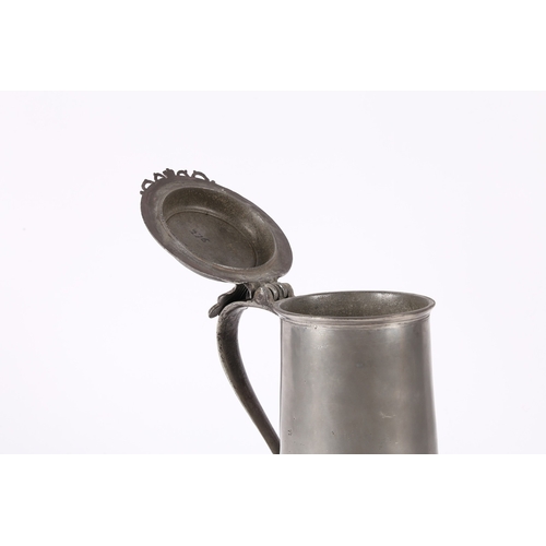 46 - A WILLIAM & MARY PEWTER FLAT-LID FLAGON, YORK, CIRCA 1690. Having a plain straight-sided and taperin... 