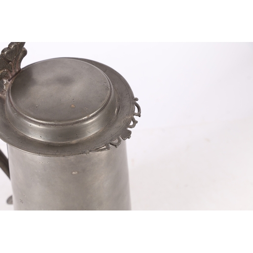 46 - A WILLIAM & MARY PEWTER FLAT-LID FLAGON, YORK, CIRCA 1690. Having a plain straight-sided and taperin... 