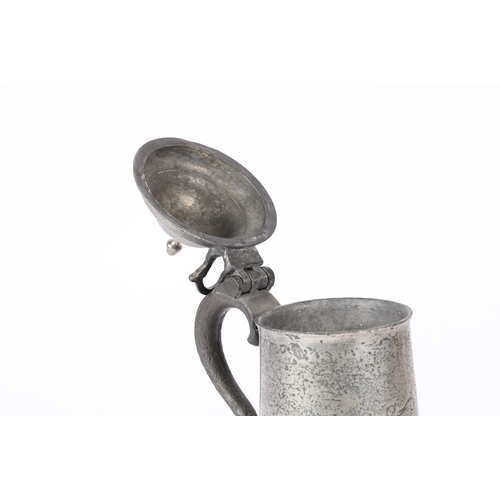 48 - A SMALL GEORGE III PEWTER SPIRE FLAGON, WORCESTERSHIRE, DATED 1776. Having a knopped dome-lid, open ... 