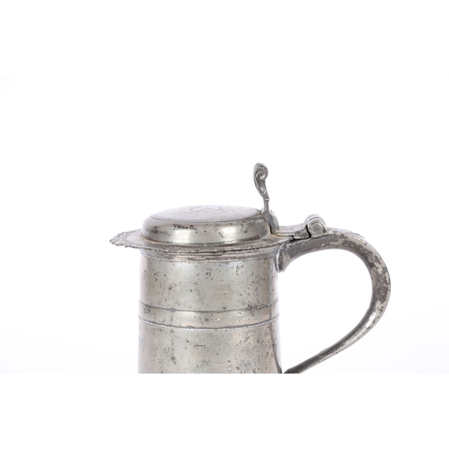 51 - A RARE CHARLES II PEWTER FLAT-LID DOUBLE-BANDED FLAGON, WIGAN, CIRCA 1680. The straight-sided drum w... 