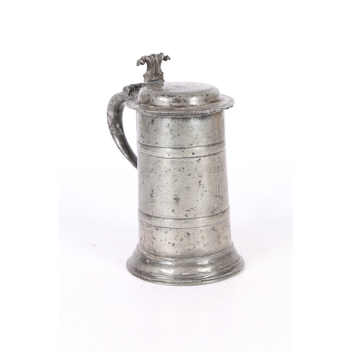 51 - A RARE CHARLES II PEWTER FLAT-LID DOUBLE-BANDED FLAGON, WIGAN, CIRCA 1680. The straight-sided drum w... 