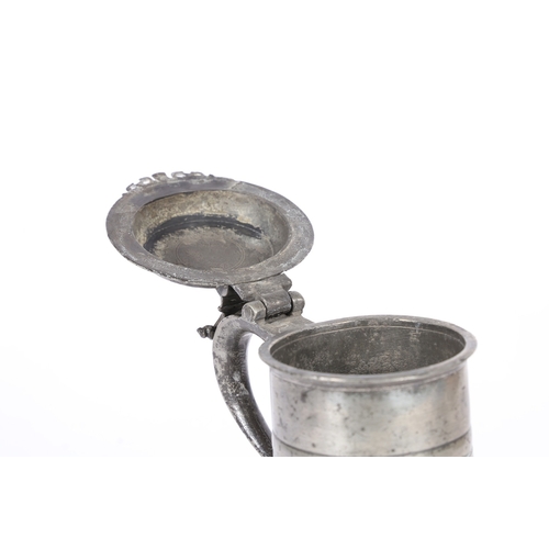 51 - A RARE CHARLES II PEWTER FLAT-LID DOUBLE-BANDED FLAGON, WIGAN, CIRCA 1680. The straight-sided drum w... 