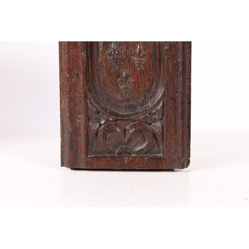 515 - AN EARLY 16TH CENTURY CARVED OAK ROYAL ARMORIAL PANEL, CIRCA 1500-20. Designed with the arms of the ... 