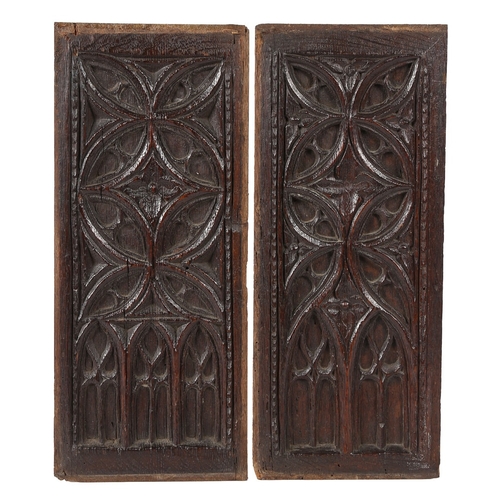 518 - TWO 15TH CENTURY OAK TRACERY CARVED PANELS, ENGLISH, CIRCA 1480. From the same decorative theme, eac... 