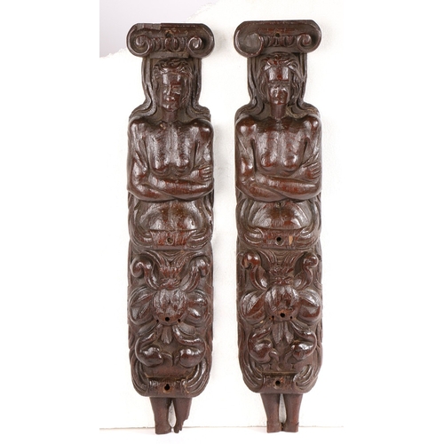 520 - AN UNUSUAL PAIR OF LATE 16TH CENTURY OAK FIGURAL TERMS, CIRCA 1580. One male, the other female, each... 