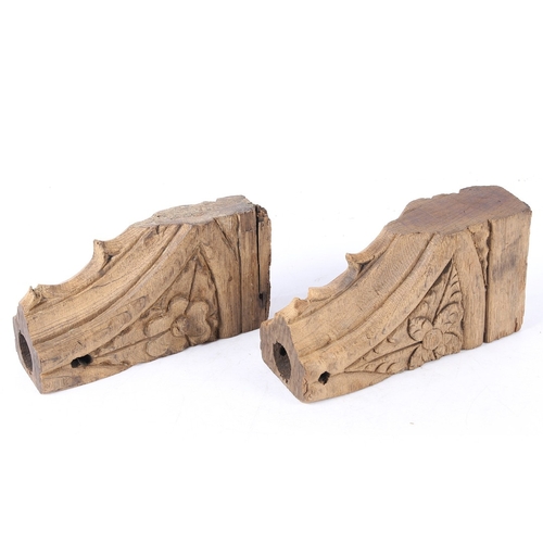 522 - A PAIR OF 15TH CENTURY ENGLISH CARVED OAK CORNER SPANDRELS. possibly from a rood screen with leaf an... 