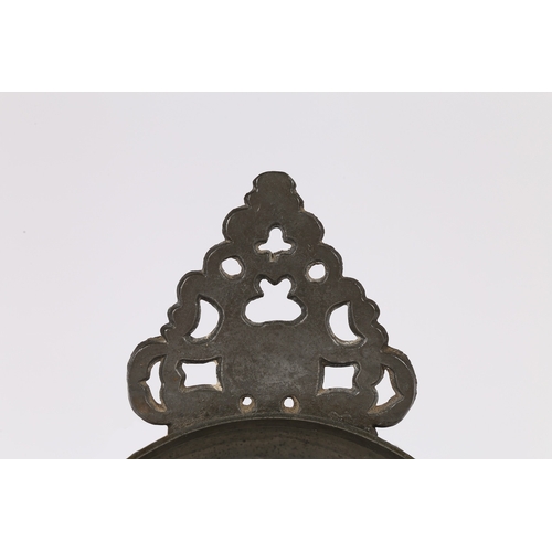 59 - A WILLIAM & MARY PEWTER PORRINGER, CIRCA 1690. Having a geometric-pierced cartouche ear bellied bowl... 