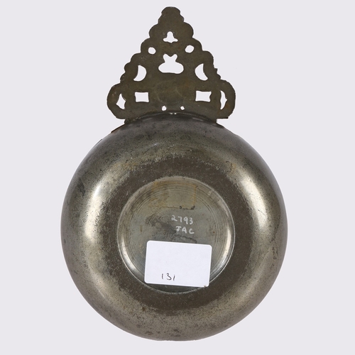 59 - A WILLIAM & MARY PEWTER PORRINGER, CIRCA 1690. Having a geometric-pierced cartouche ear bellied bowl... 