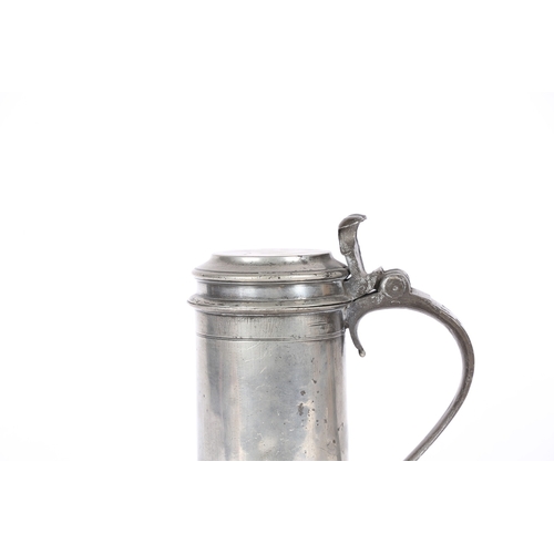 68 - A SMALL CHARLES II PEWTER BEEFEATER FLAGON, CIRCA 1680. The straight-sided drum plain except for pai... 