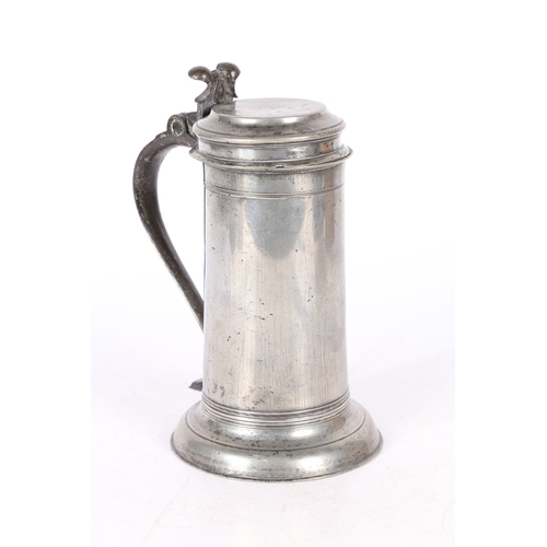 68 - A SMALL CHARLES II PEWTER BEEFEATER FLAGON, CIRCA 1680. The straight-sided drum plain except for pai... 