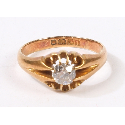 1 - A GENTLEMANS 18 CARAT GOLD AND DIAMOND RING. with a central diamond measuring approximately 0.5ct in... 