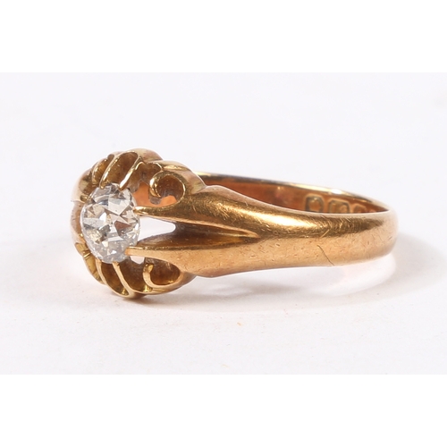 1 - A GENTLEMANS 18 CARAT GOLD AND DIAMOND RING. with a central diamond measuring approximately 0.5ct in... 