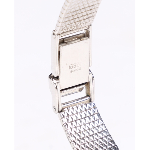 100 - A LONGINES 9 CARAT WHITE GOLD LADIES WRISTWATCH. the signed silver dial with baton markers, manual w... 