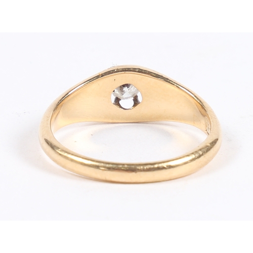 13 - A YELLOW METAL AND DIAMOND SOLITAIRE RING. the pierced head set with a single round cut diamond, rin... 