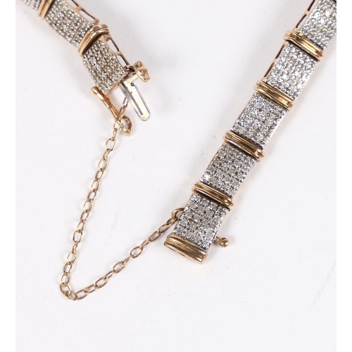 17 - A 9 CARAT GOLD AND DIAMOND BRACELET. formed from nineteen rectangular panels each set with twenty ro... 