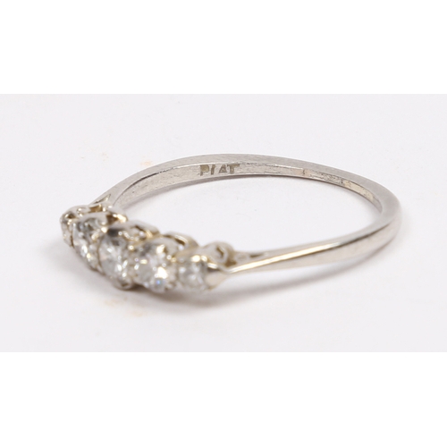 18 - A PLATINUM AND DIAMOND RING. the head set with five graduated circular diamonds, approximately 0.40c... 